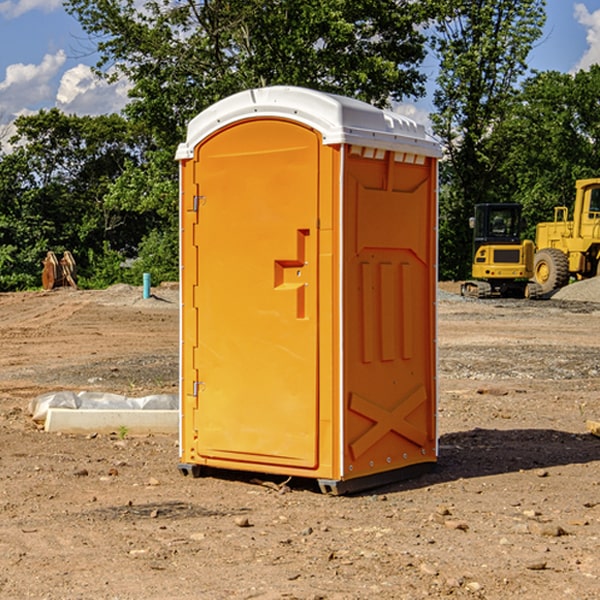 how often are the portable restrooms cleaned and serviced during a rental period in Amber OK